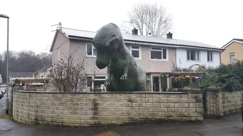Wales news service The dinosaur in the front garden