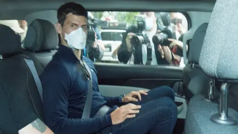 EPA Novak Djokovic pictured in a car in Australia in January, as he battled to stay in the country to compete in the Australian Open