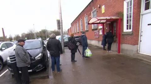 Queue at Royal Mail sorting office