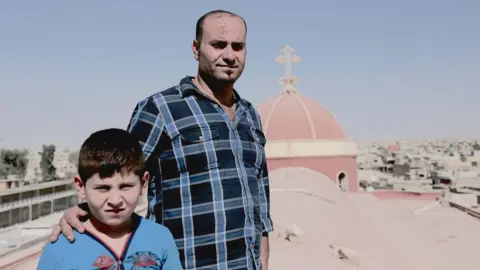 Jewan Abdi Marwan and Marvin Yashua in Qaraqosh