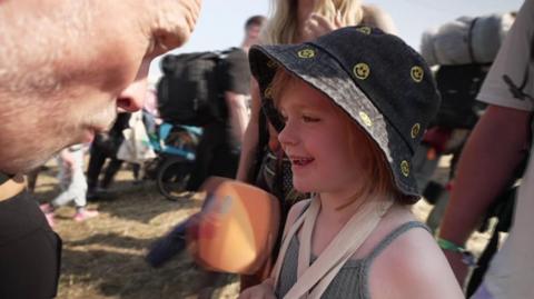 Colin Paterson interviewing girl, five