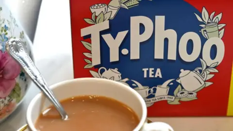 Getty Images Cup of tea in front of Typhoo Tea box