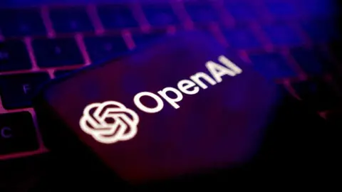 Reuters The OpenAI logo is set against a keyboard