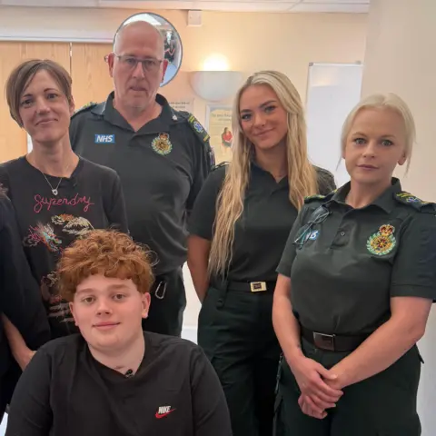 Flynn and family and medics