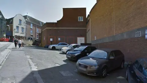 Google Street View image of the car park behind 