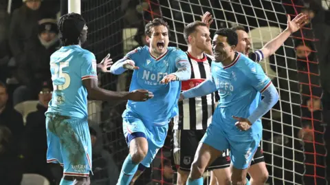 Aaron Pressley celebrates a goal