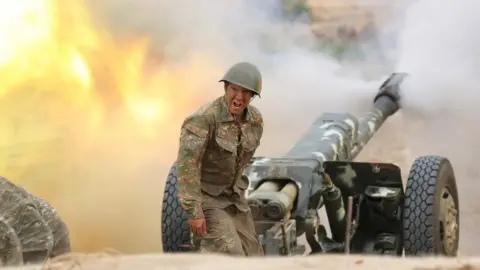 EPA A handout photo made available by the Armenian Defense Ministry on 30 September 2020 on its official website shows Armenian soldier during military clashes