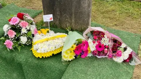 South Yorkshire Police Flowers at grave site
