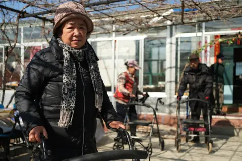 Xiqing Wang/ BBC Residents at Ms Tang’s care home