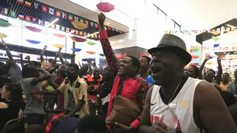 EPA French football fans in Abidjan, Ivory Coast - Sunday 15 July 2018