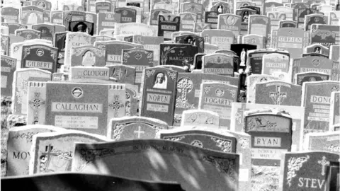 Boston Globe via Getty Images 1987 image of cemetery near Boston