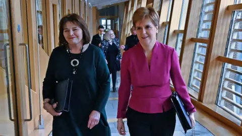 Getty Images Jeane Freeman and Nicola Sturgeon