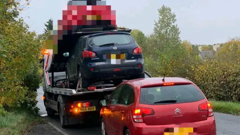 Derbyshire Police Cars being seized