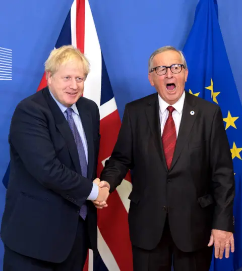 Stefan Rousseau/PA Boris Johnson and Jean-Claude Juncker