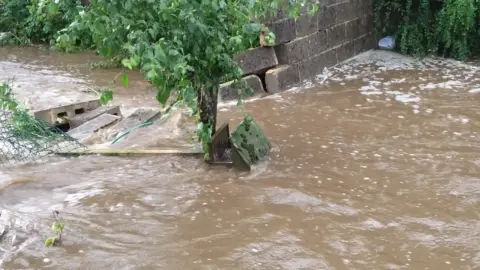 Cheryl Corbett Flood water in Leyburn