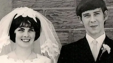 Family photo Janice and David Hunter on their wedding day