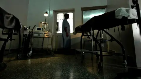 Getty Images A woman waiting for a surgical abortion.