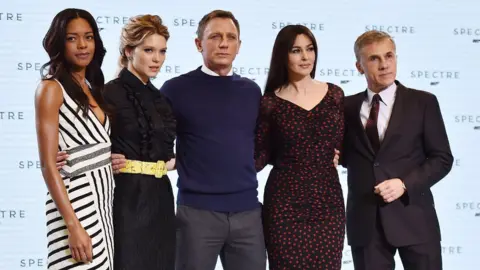 Getty Images Daniel Craig with co-stars Naomie Harris, Lea Seydoux, Monica Bellucci and Christoph Waltz at the Spectre launch in 2014