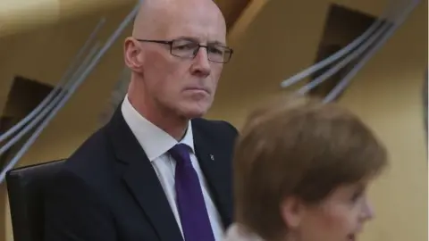 PA Media John Swinney