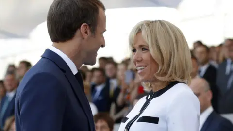 EPA President Emmanuel Macron and his wife Brigitte were there.