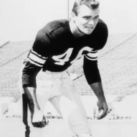 Getty Images Reynolds poses in football gear