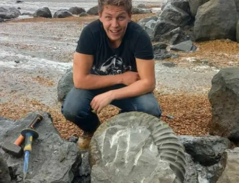 Wight Coast Fossils Jack Wonfor with the ammonite