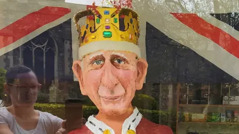 Sharon Kulesa A model of King Charles on display in a shop in Stowmarket.