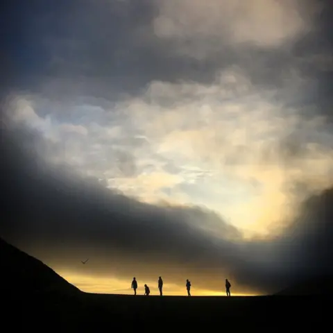 Matt Bolton People walking at sunset