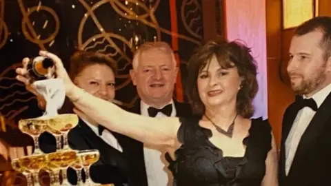 Family photo Right to left: Stephen Evans, Beverley Davies and Geoffrey Davies on the Grand Princess last week