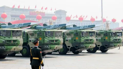 Getty Images Image shows DF-17 medium-range ballistic missiles equipped with a DF-ZF hypersonic glide vehicle, involved in a military parade to mark the 70th anniversary of the Chinese People's Republic