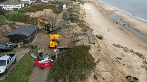 Supplied House and cliffs at Hemsby