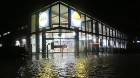 Jason Richardson A flooded Lidl store in Bourne