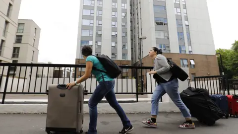 Getty Images Residents leaving Chalcots estate