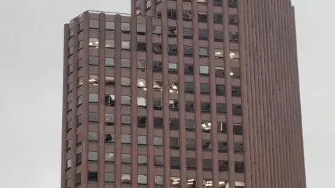 Blown out windows of building in Houston
