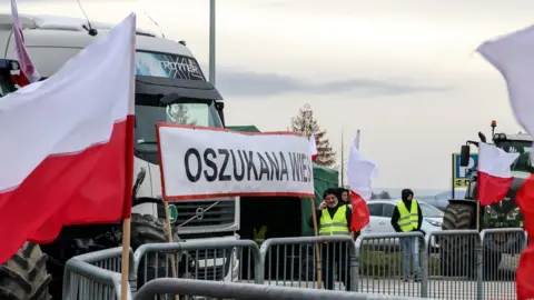 Getty Images Polish farmers at the Medyka border crossing between Poland and Ukraine, November 2023.