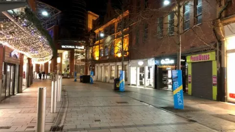 PA Media Empty street in Belfast city centre