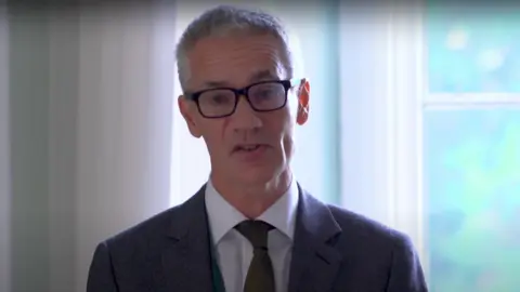 Hinchingbrooke School Head shot of Mark Patterson on a blank background