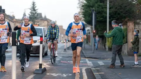 PA Media Kevin Sinfield during day one of the Ultra 7 in 7 Challenge from Murrayfield to Melrose