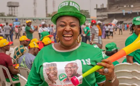 BBC Woman wearing a hat that says Atiku Babes