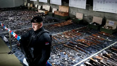 Getty Images Guns handed in following the amnesty