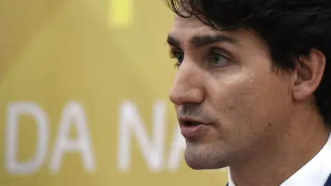 AFP/Getty Images Canada's Prime Minister Justin Trudeau speaks at a press conference