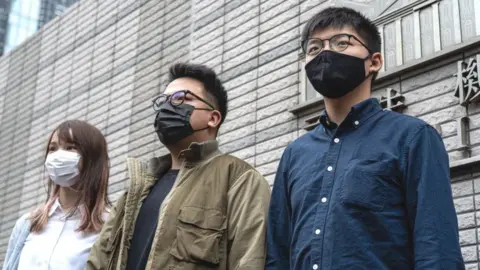 Getty Images Agnes Chow, Ivan Lam And Joshua Wong