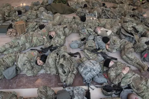 EPA Hundreds of National Guard sleep on the floor
