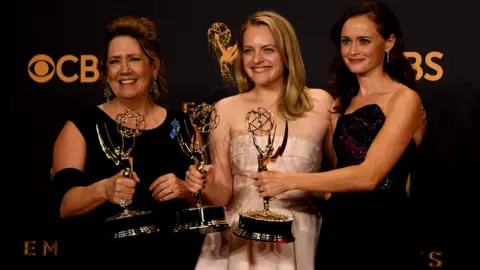 AFP Ann Dowd, Elisabeth Moss and Alexis Bledel