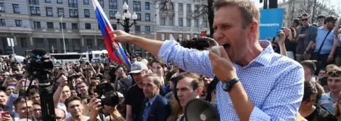 AFP/Getty File photo taken on May 5, 2018 Russian opposition leader Alexei Navalny addressing supporters