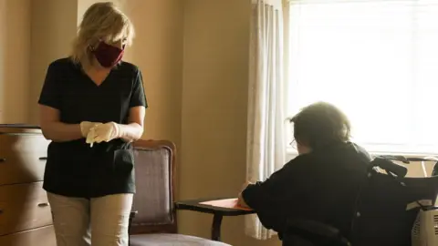 Getty Images care home with masked worker