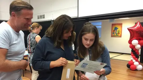 BBC Mia with parents