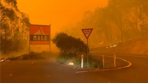 Chad Staples Fire and orange skies in Mogo