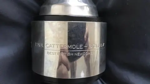 Paul Cattermole Paul Cattermole's S Club 7 Brit Award has been listed on eBay