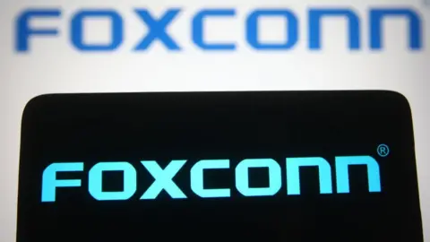 Getty Images Foxconn logo seen on an iPhone